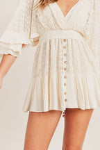 Cream lace crochet romper sleeve detail