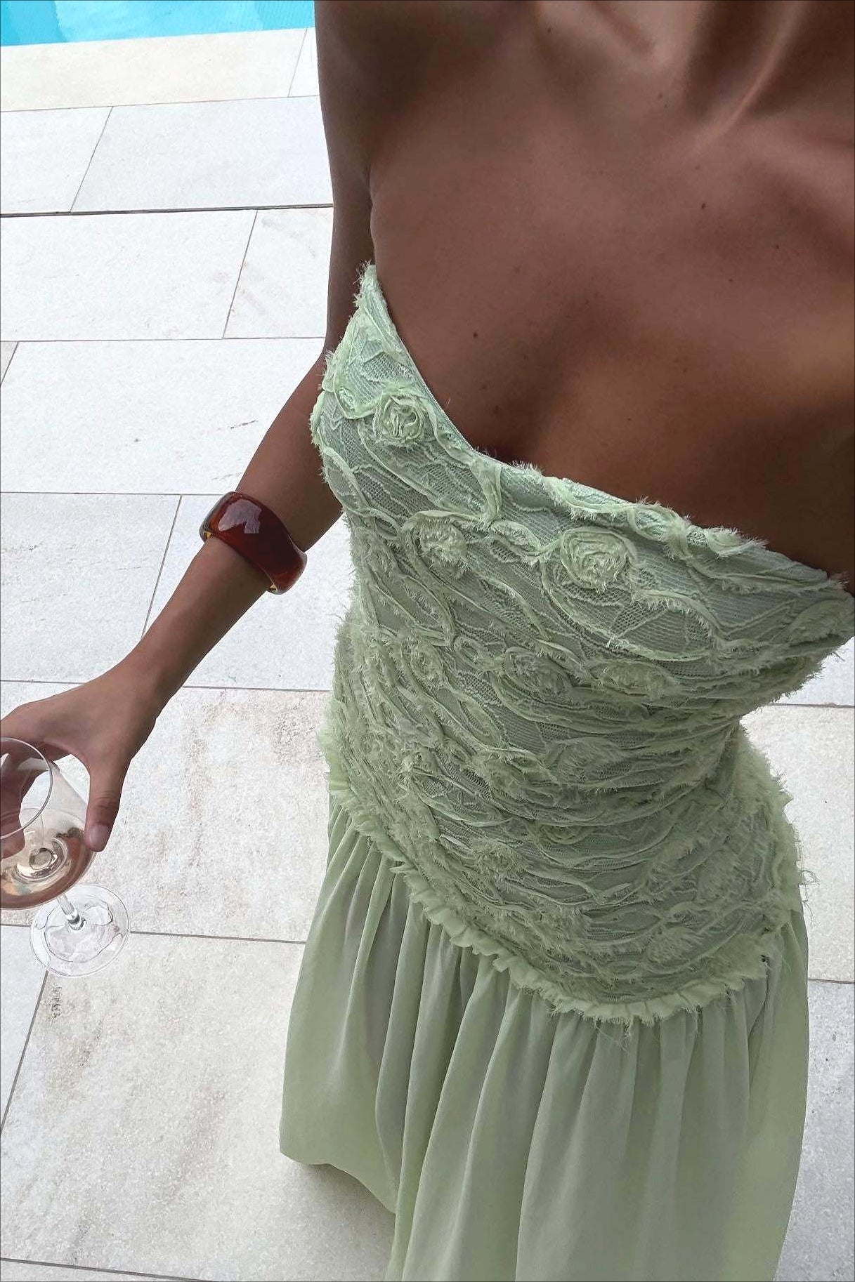 Floral strapless chiffon maxi dress styled with heels