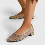 Pointed toe studded ballet flats side view
