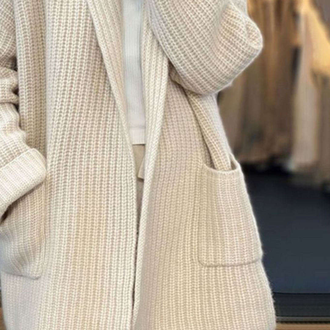 Cream knit cardigan deep patch pockets detail