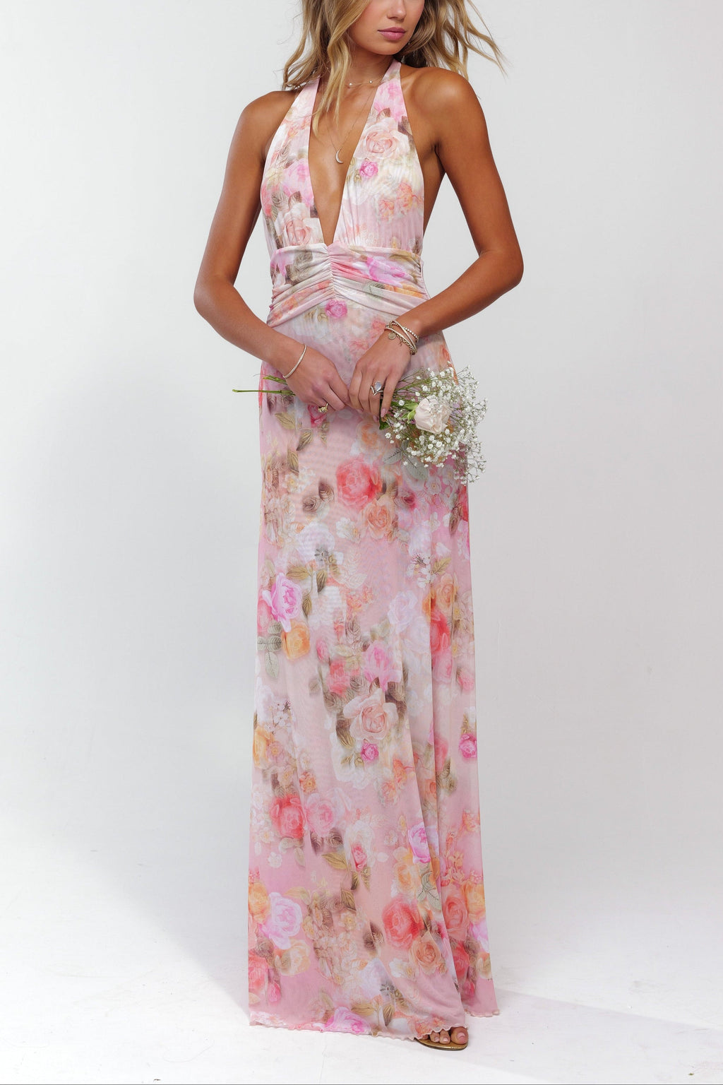 Pink floral maxi dress with deep V-neck halter neckline, front view