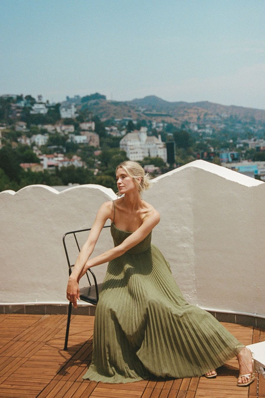 Green tulle pleated maxi dress, side view