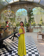 Lime yellow strapless maxi dress ruched bodice, pleated skirt, elegant silhouette