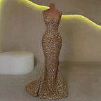 Gold sequin mermaid gown side view