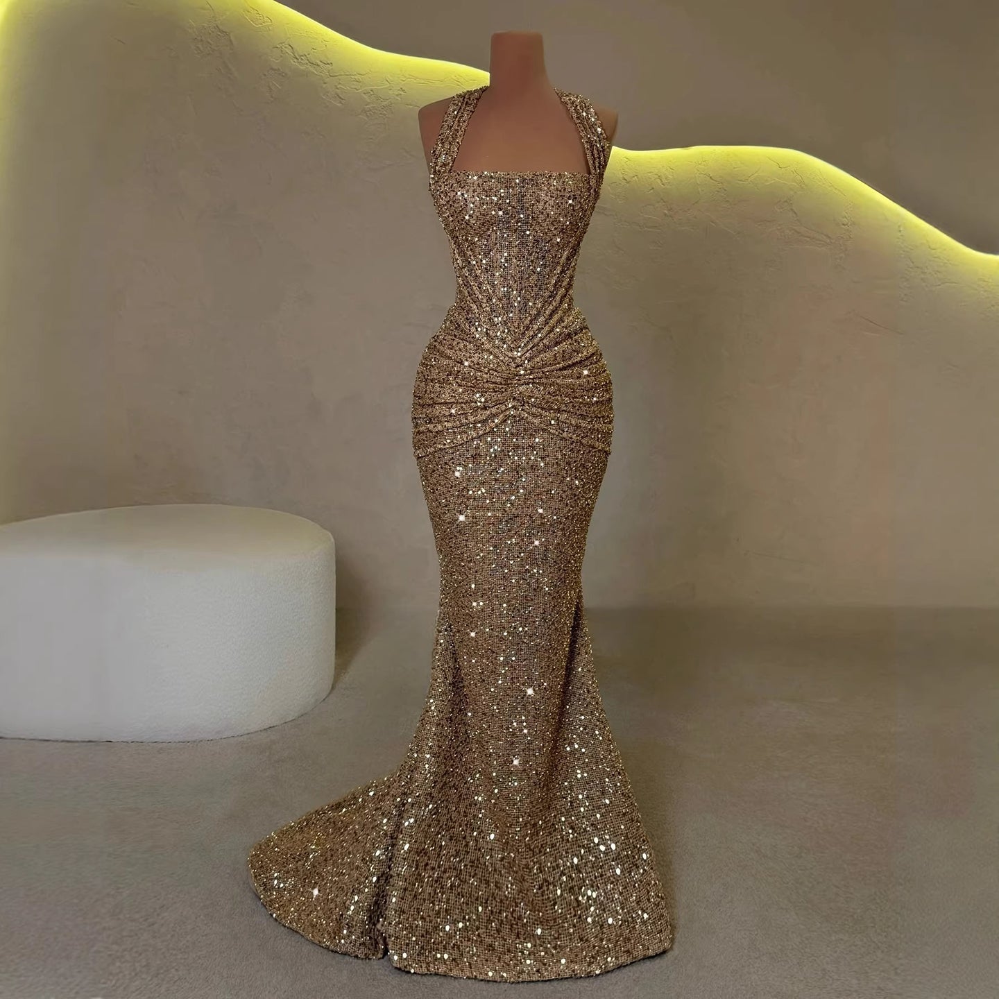 Gold sequin mermaid gown side view