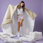 The Meringue Comforter in Sand, held open