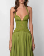 Green halter neck maxi dress bodice detail