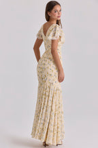 Yellow floral maxi dress movement