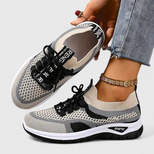 Orthopedic walking sneakers on foot, detail