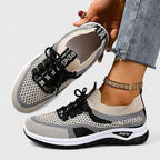 Orthopedic walking sneakers on foot, detail