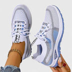 Blue orthopedic lace-up walking sneakers, side view
